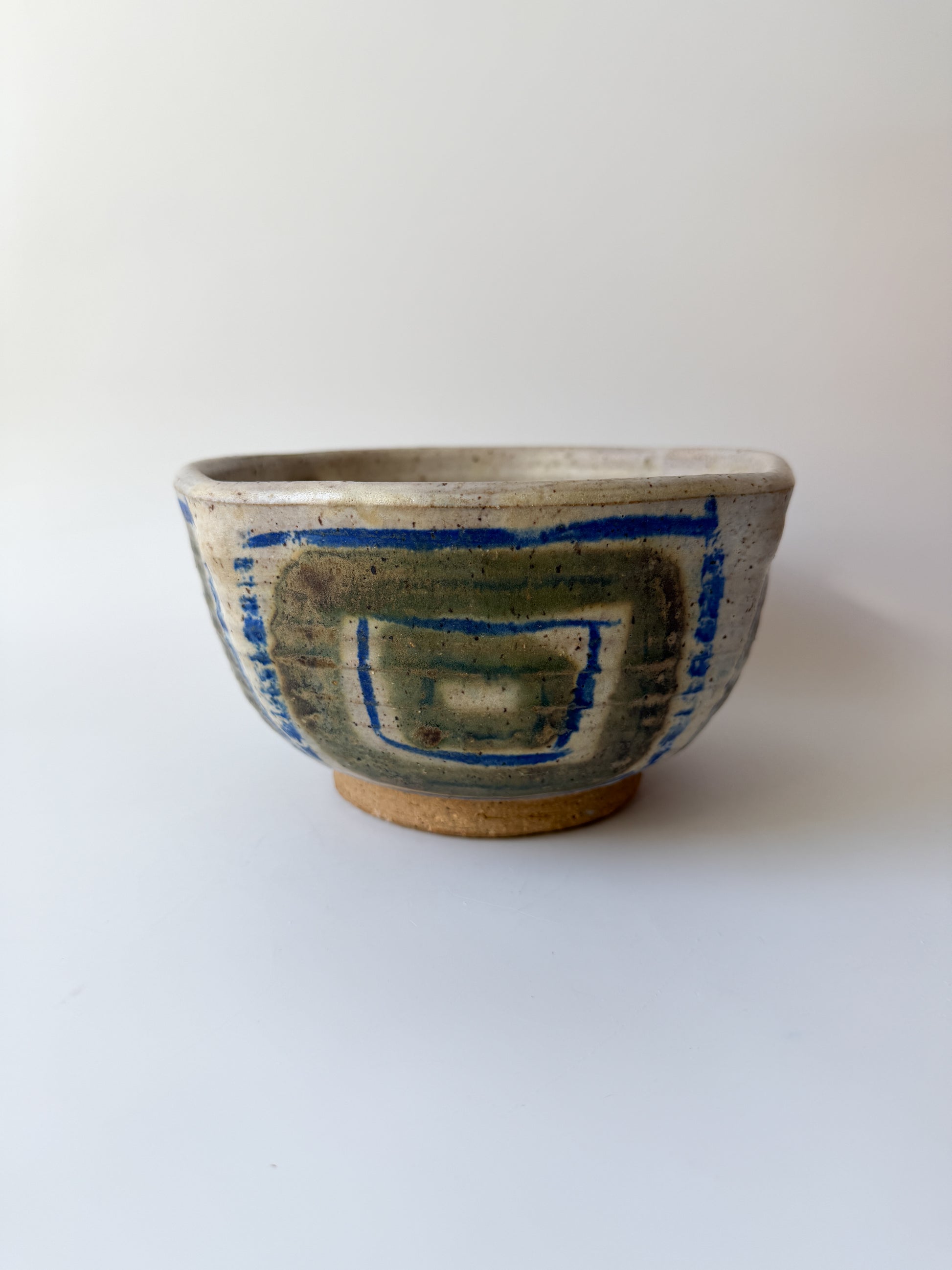 Handmade Pottery Bowl with Blue and Brown Abstract Design