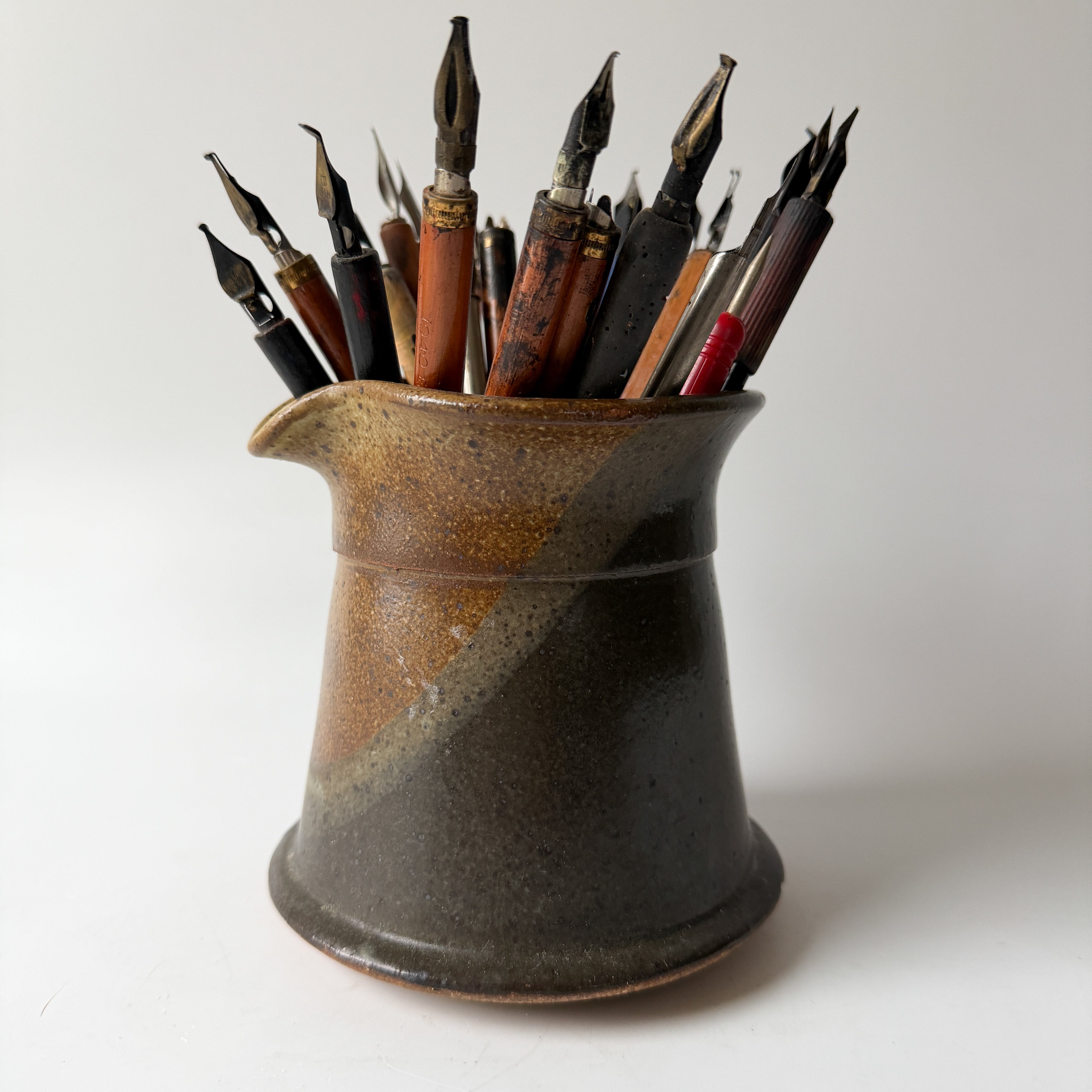 Artist's Vintage Ink Pens in Pottery Pitcher
