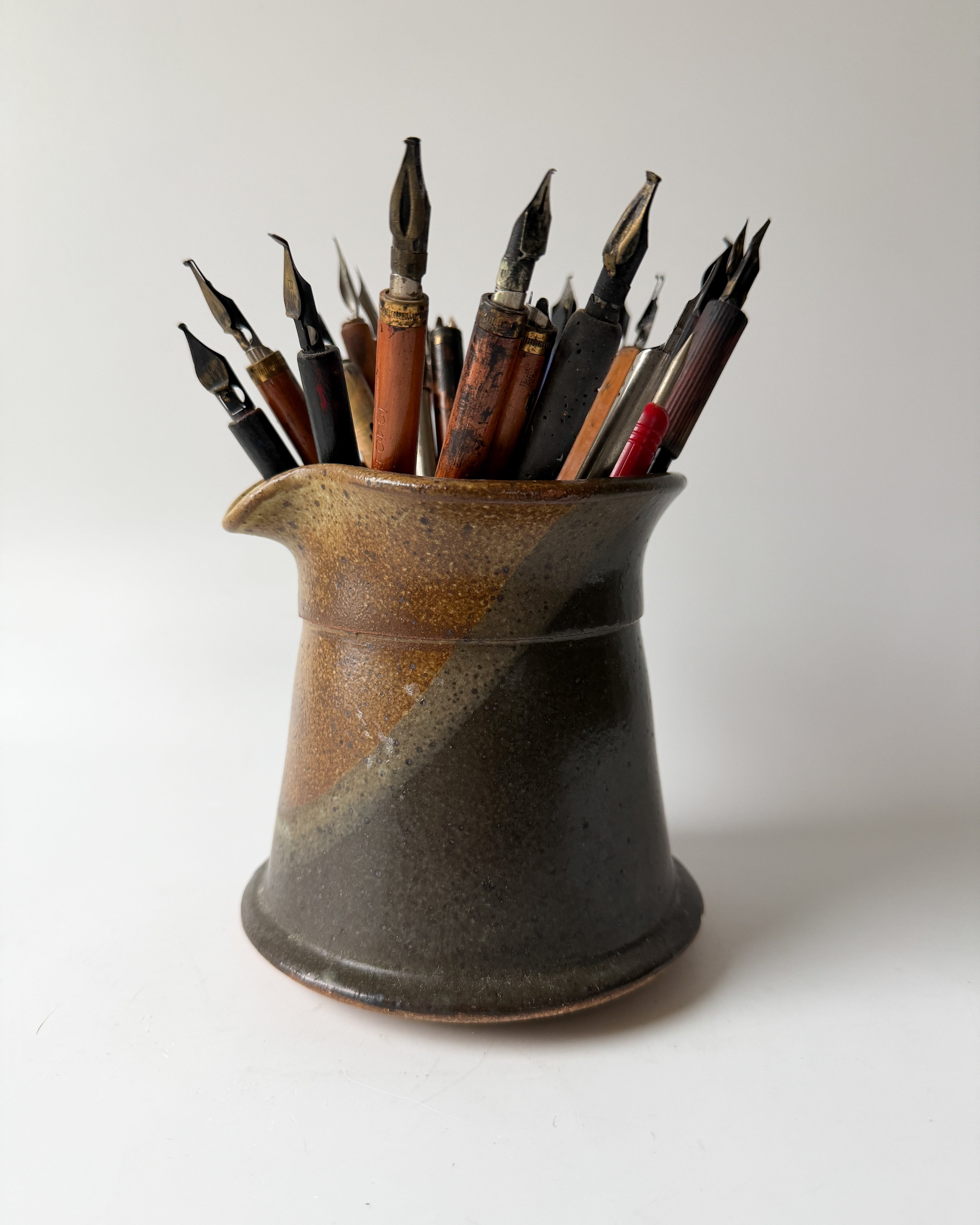 Artist's Vintage Ink Pens in Pottery Pitcher