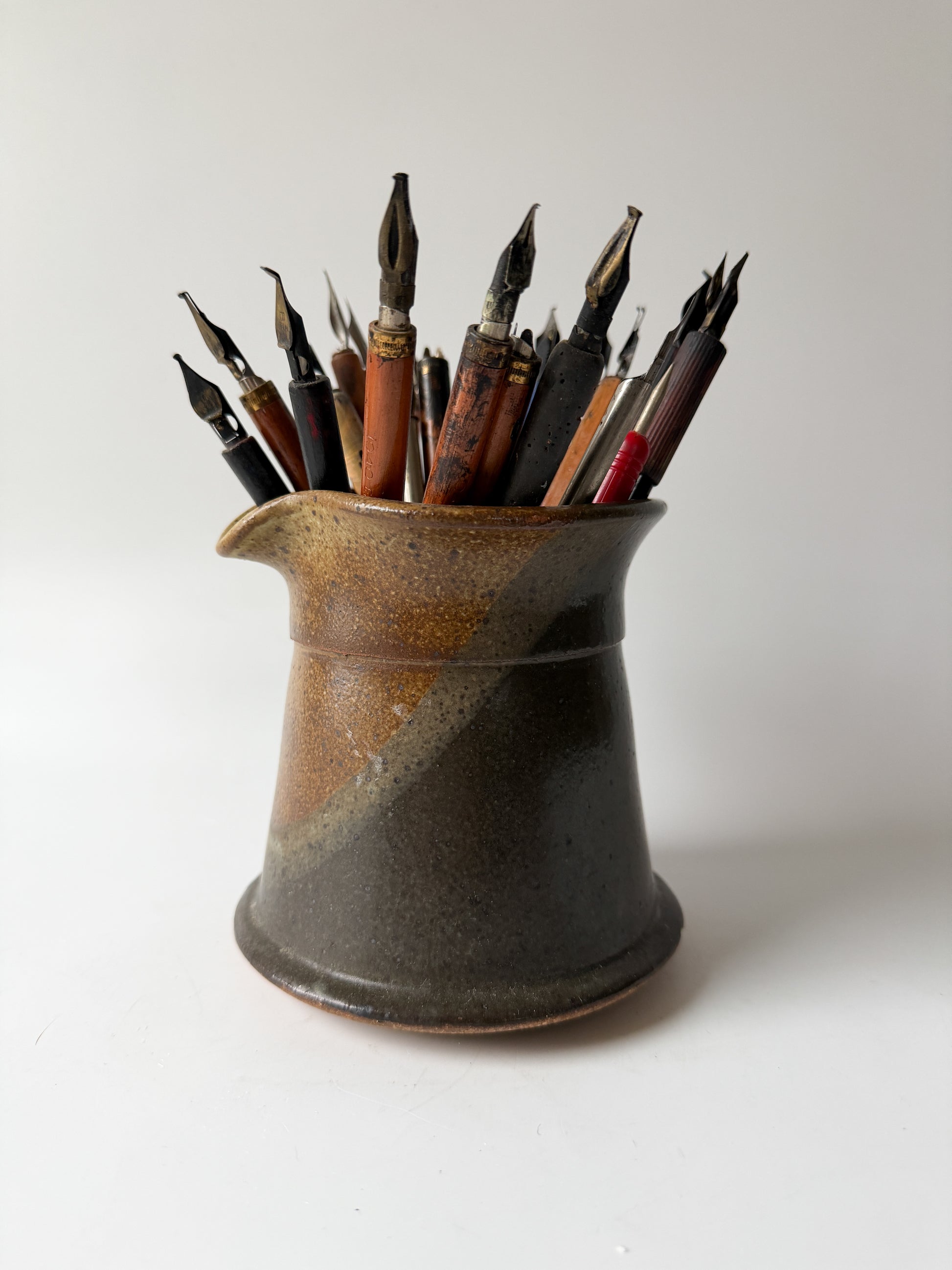 Artist's Vintage Ink Pens in Pottery Pitcher