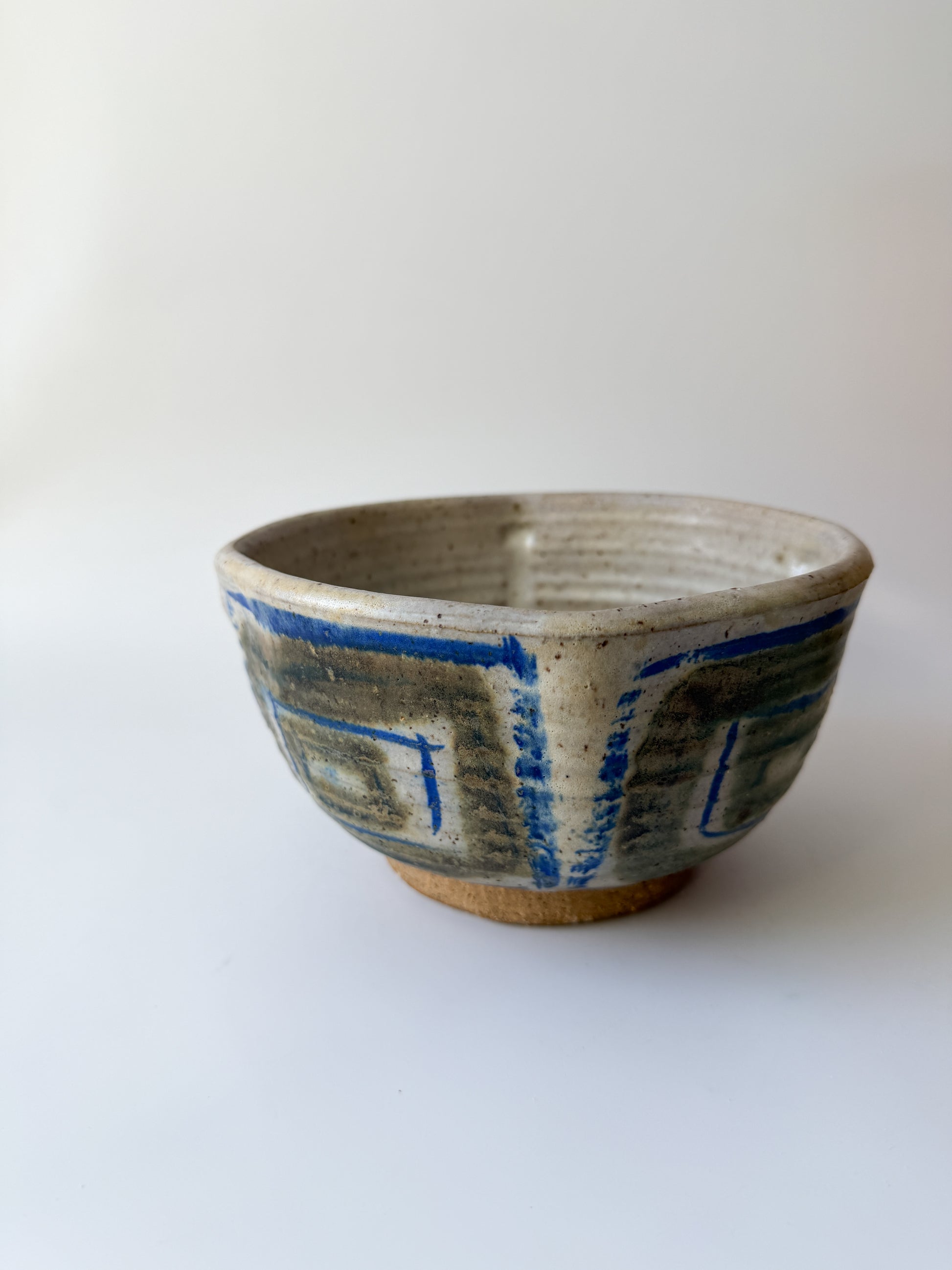 Handmade Pottery Bowl with Blue and Brown Abstract Design