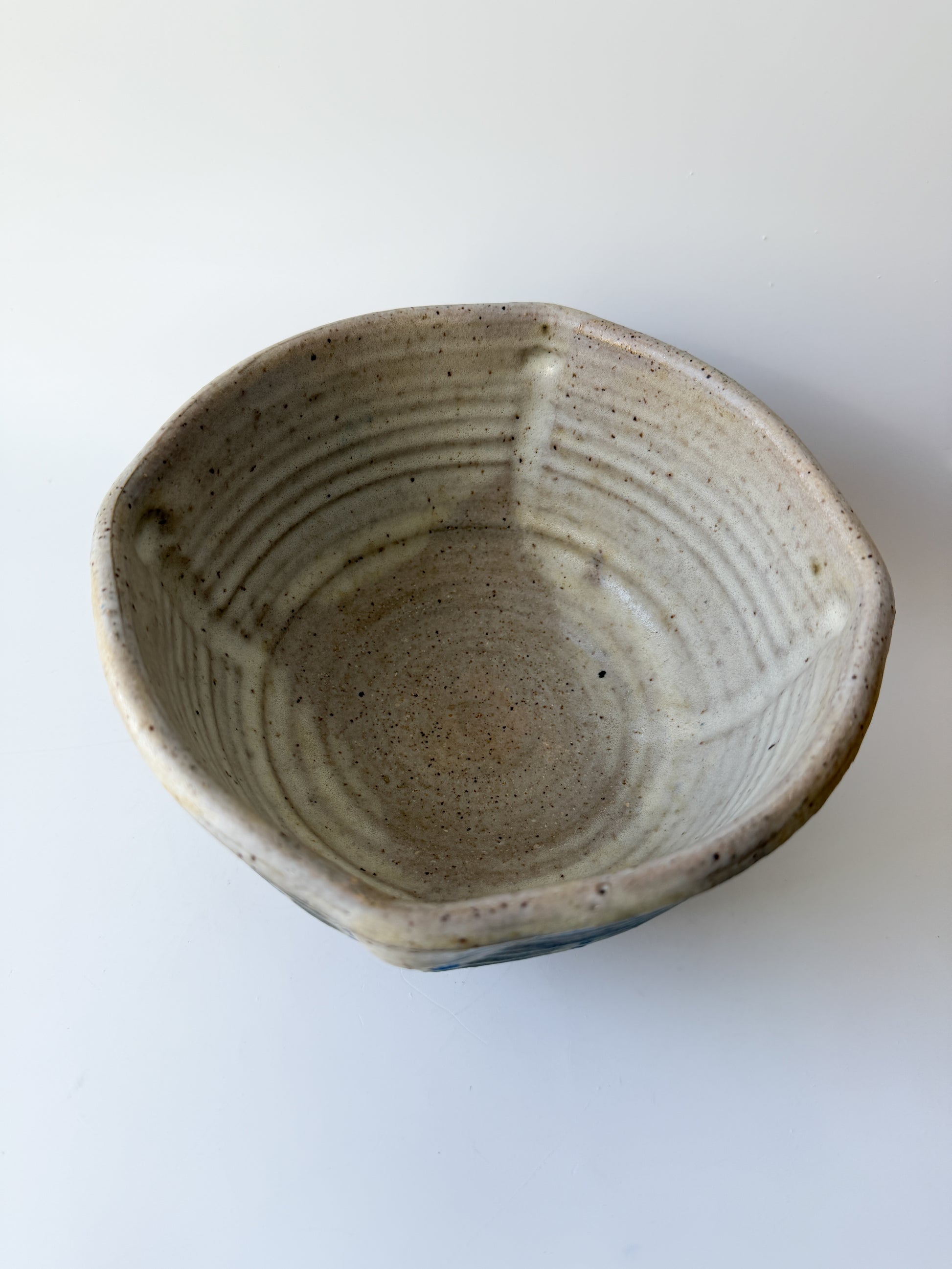 Handmade Pottery Bowl with Blue and Brown Abstract Design