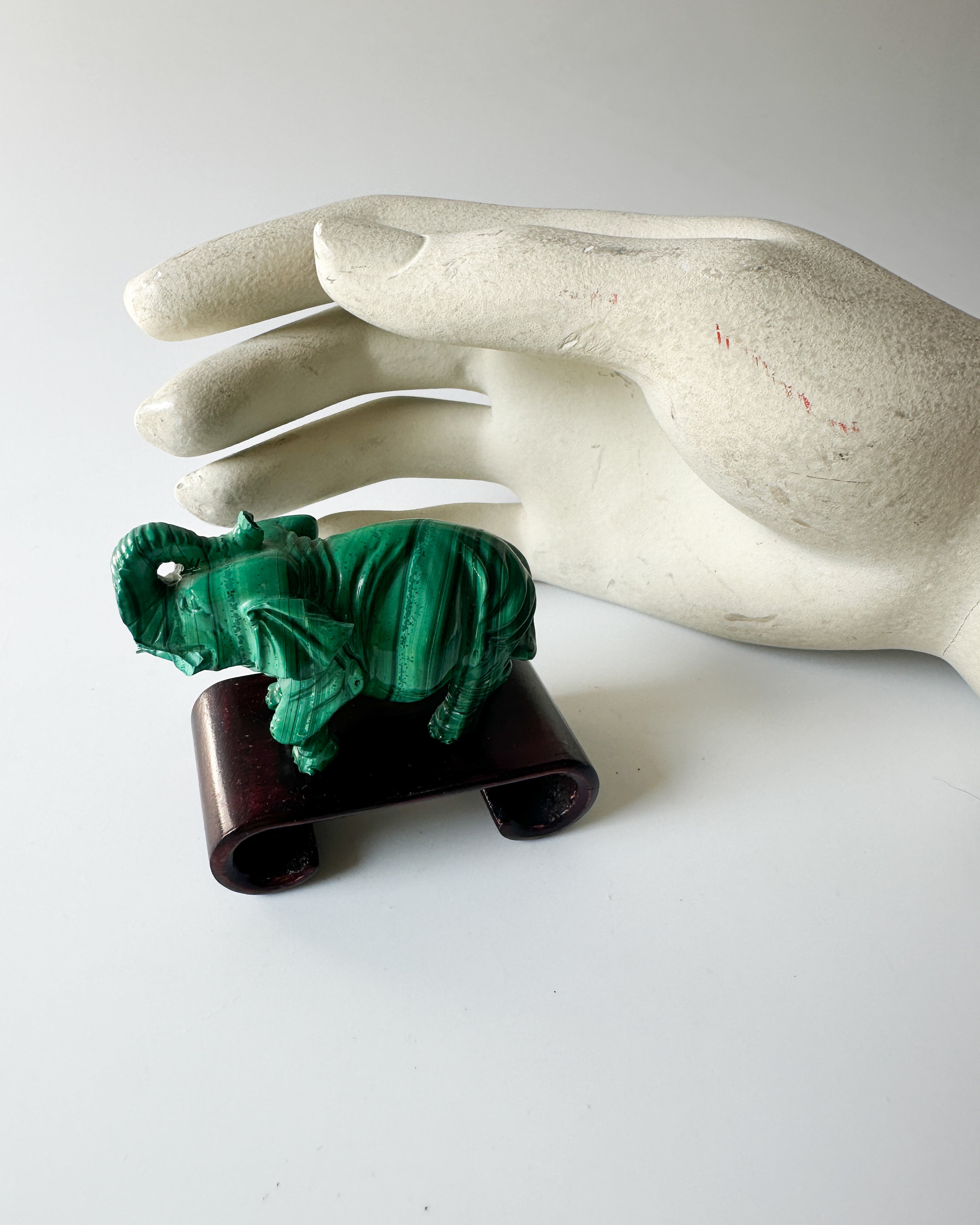 Genuine Malachite Elephant with Wood Stand (2.3125"L x 1"W x 1.75"H)