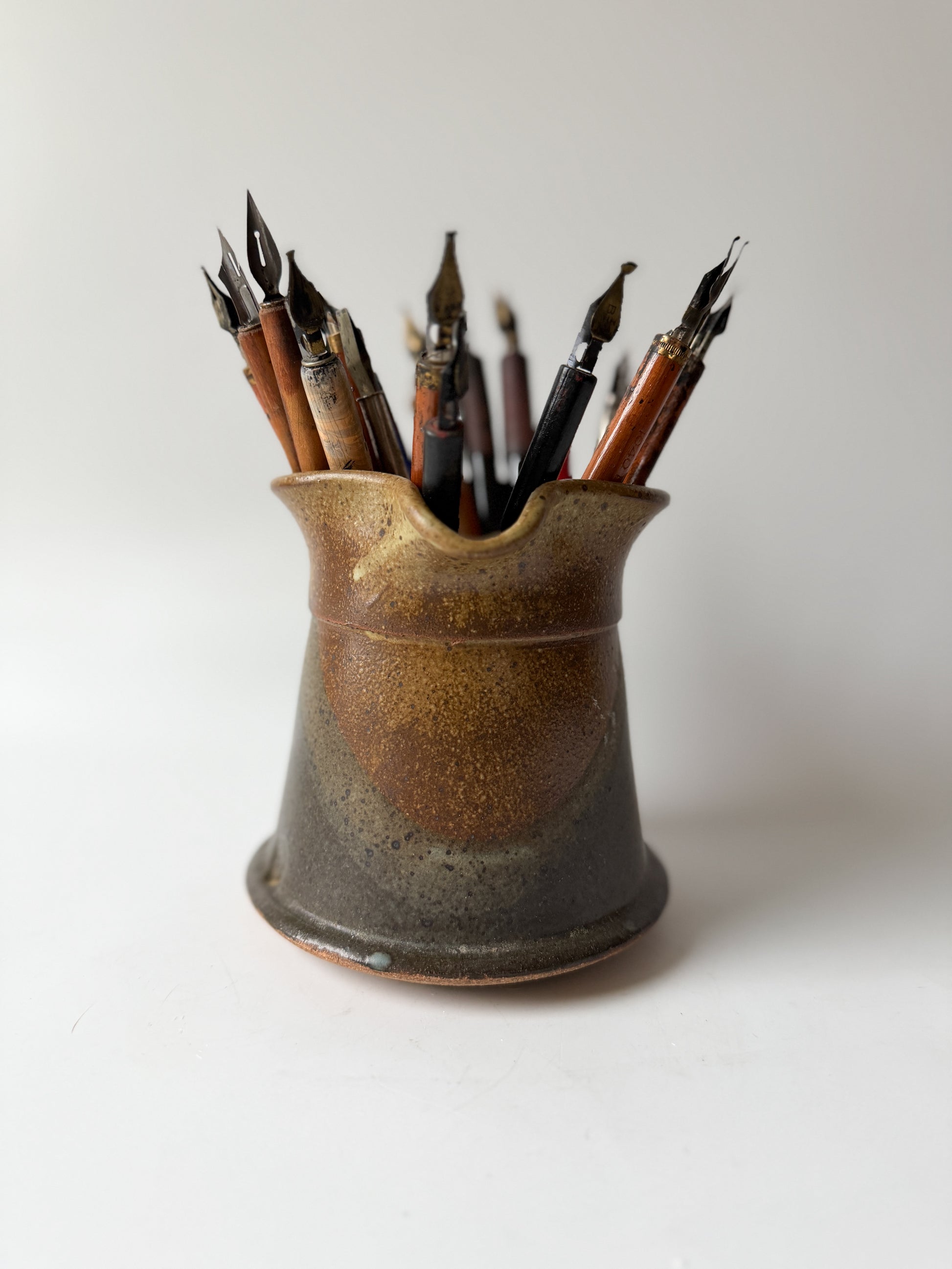 Artist's Vintage Ink Pens in Pottery Pitcher