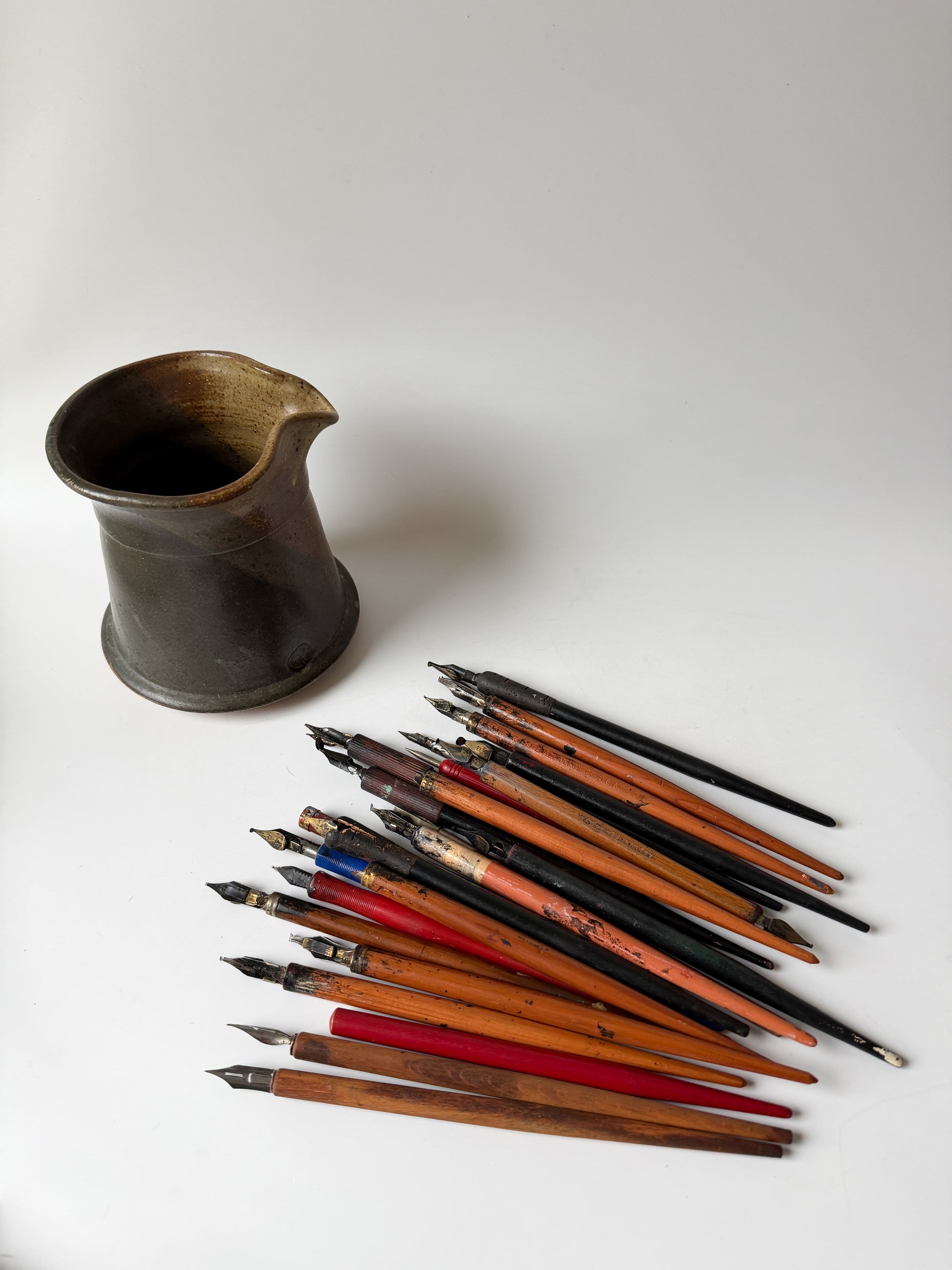 Artist's Vintage Ink Pens in Pottery Pitcher